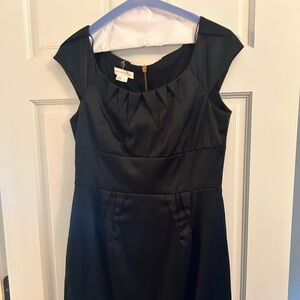 Knee length black fitted cocktail dress